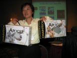 Daphne holding two versions of VGA Apogee box during the vote